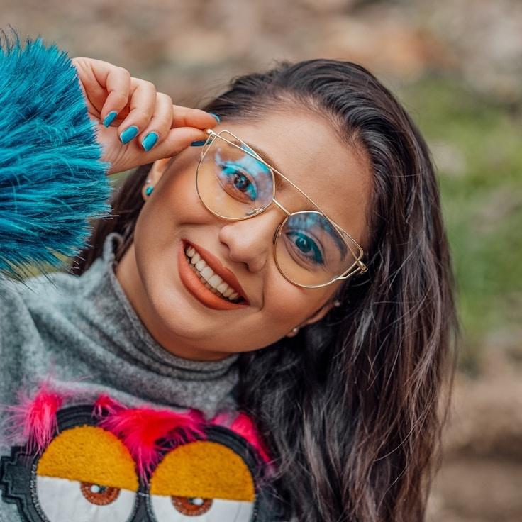 Alex Rivera, Lead Design Curator at Hush Mint Sprout, reviewing corporate floral arrangements